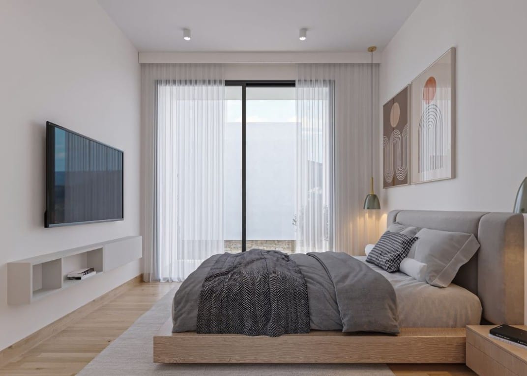 Bedroom interior with sliding doors in the Kissonerga detached house
