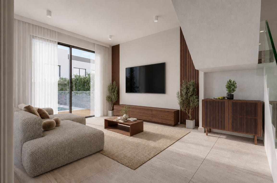 Living area with sliding doors to the pool terrace in the Geroskipou Coast villa