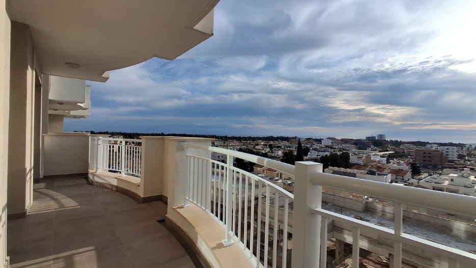 Covered veranda with city views at a Central Paphos apartment