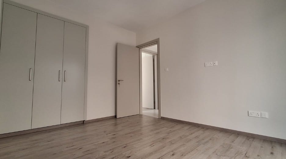 Bedroom with fitted wardrobes in a 3-bedroom Central Paphos apartment