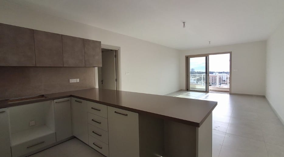 Open-plan kitchen and living area in a 3-bedroom Paphos apartment