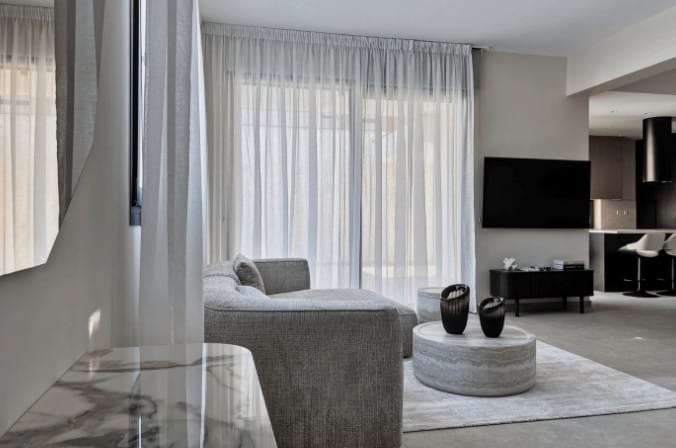Modern open-plan living area in a 3-bedroom Limassol apartment