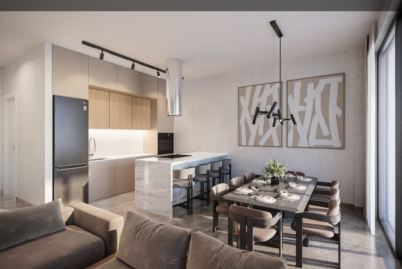 Open-plan kitchen and dining area in a modern apartment in Tremithousa