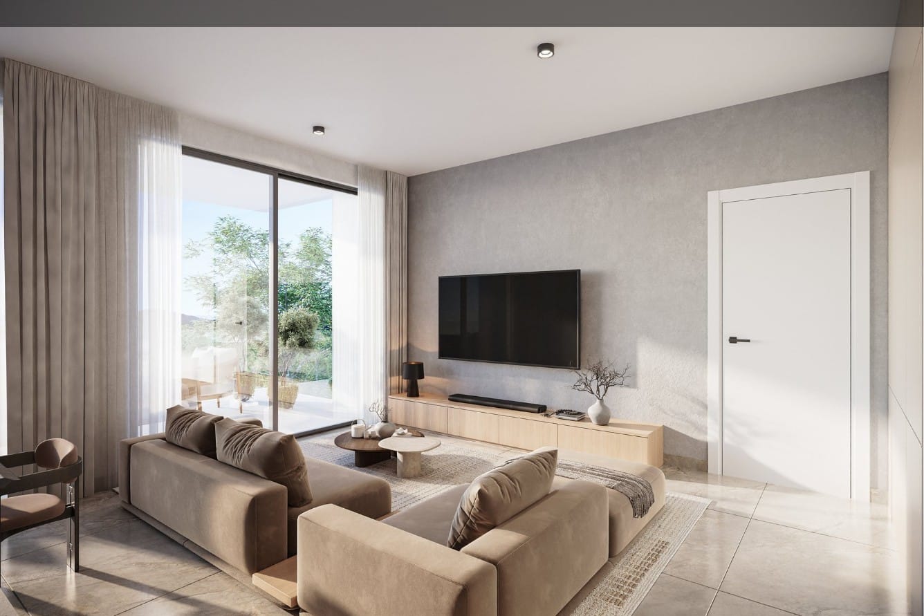 Living room with sliding doors to the veranda in a Tremithousa apartment
