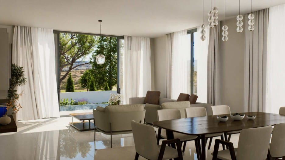 Living and dining space opening to the garden at villa in Agios Athanasios, Limassol